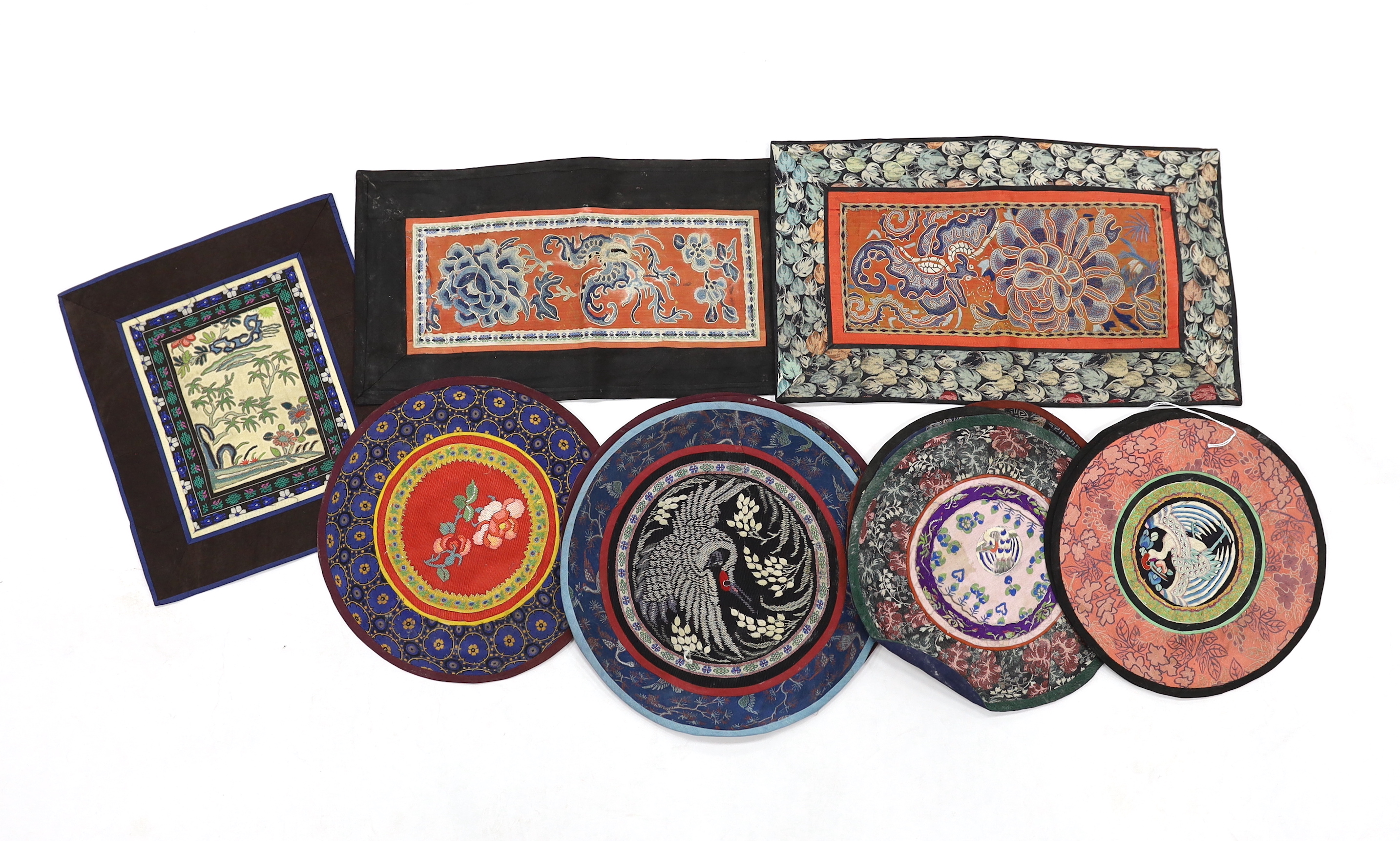 Three Beijing knot silk embroidered rectangular mats with damask borders, seven circular bird motif embroideries and two of deer and birds (12)